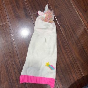 Cozy a unicorn sweater for your little pup